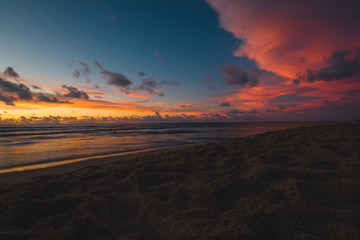 Fototapeta na wymiar Sunset in a Beautiful Beach in Kauai, Hawaii