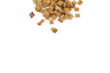 A scattering of crackers made from wheat bread