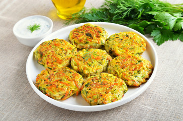 Tasty vegetable cutlets from zucchini, carrot, herbs