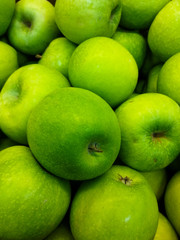 green apples on black background