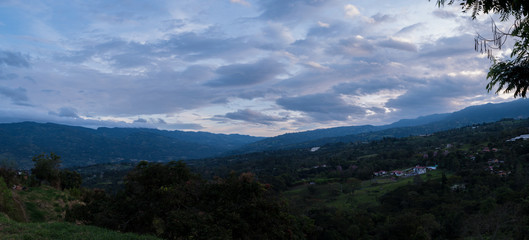 view of mountains and clouds of a dawn