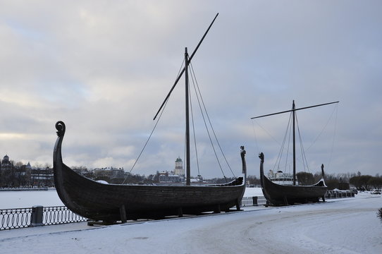 Viking boat drakkar on the embankment of the city of Vyborg