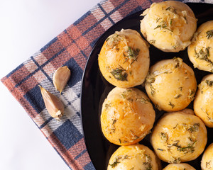 garlic baked goods .baked buns on a towel top view