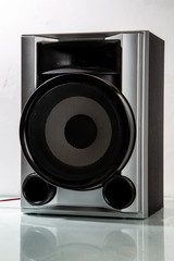 Home entertainment speaker on a glass table