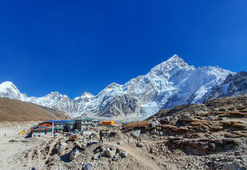 Gorak Shep village and Lhotse mountain on the back side. Everest base camp trek: from Lobuche to Gorak Shep, Nepal, Himalayas.