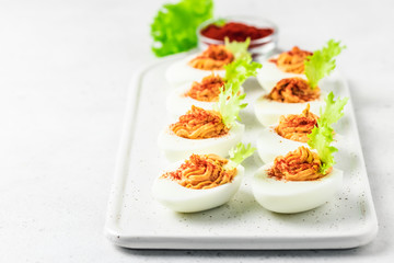 Smoked paprika deviled eggs. Selective focus, space for text.