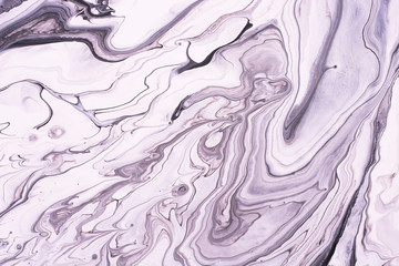 Mixed black and white acrylic paint. Marble effect. Abstract background for design.