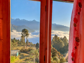 Window view on Taksindu La pass. Taksindu village. Everest base camp trek: way from Kharikhola to Taksindu. Himalayas, Solokhumbu, Nepal.