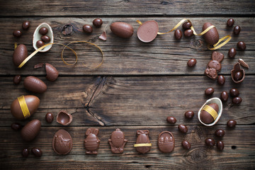 chocolate eggs on dark wooden background