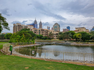DUBAI, UAE - NOVEMBER 2019: Tecom distric with its fantastic skyscrapers, green parks and cozy cafes.