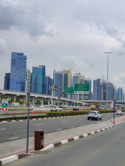 DUBAI, UAE - NOVEMBER 2019: Tecom distric with its fantastic skyscrapers, green parks and cozy cafes.