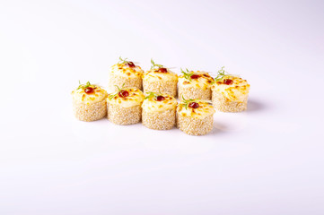 baked rolls with sesame seeds on a white background