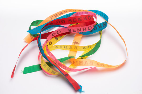 Lucky bracelets typical of Bahia, Brazil (Lembran&ccedil;a do Senhor do Bonfim da Bahia). Translation: Reminder of our Sir of Bonfim of Bahia).