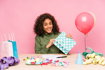 Young african american woman planning a birthday