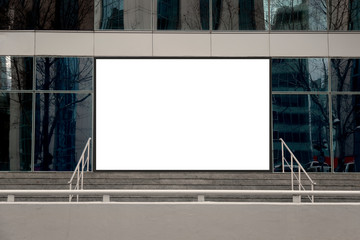 Blank white billboard in modern building