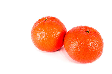 Red mandarins isolated on white background