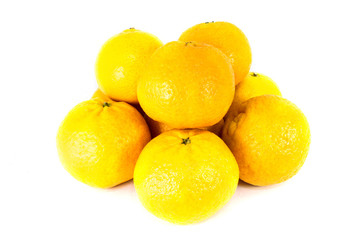 Yellow mandarins isolated on white background