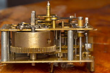 Vintage watch machine macro detail. Close up of old clock.