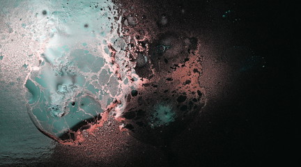 Reflection of colors in water isolated on black background, effect nebula texture 