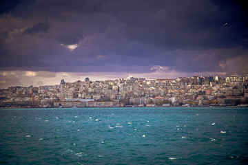 View of Istanbul European sides by the Bosporus under dramatic clouds