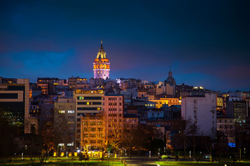 Fototapeta na wymiar Galata Tower During Twilight With City View From Golden Horn Istanbul