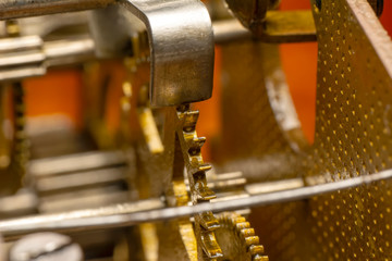 Vintage watch machine macro detail. Close up of old clock.