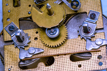 Vintage watch machine macro detail. Close up of old clock.