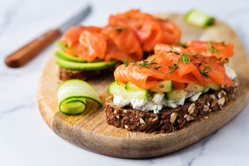 Smoked salmon ricotta cheese  rye sandwich