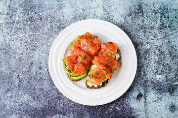 Smoked salmon ricotta cheese  rye sandwich