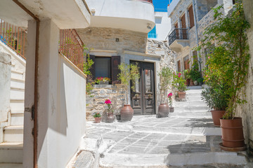 Greek Island village scene in Filoti. - obrazy, fototapety, plakaty