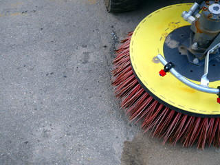  asphalt cleaning machine brushes closeup