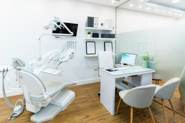 Dentist office. Dentist chair in high class dental clinic. VIP service in medical care. Dentist...