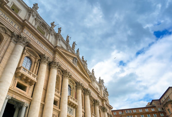 Fototapeta na wymiar Vatican City - May 30, 2019 - St. Peter's Basilica and St. Peter's Square located in Vatican City near Rome, Italy.