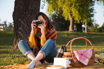 Beautiful smiling woman having weekend picnic
