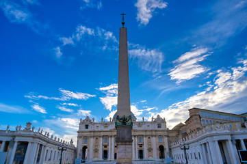 Fototapeta premium Vatican City - May 30, 2019 - St. Peter's Basilica and St. Peter's Square located in Vatican City near Rome, Italy.