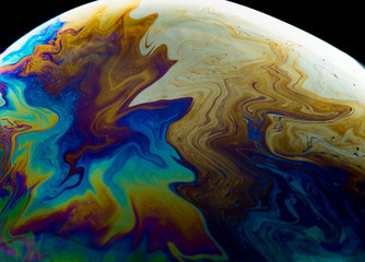 Colors and shapes created in a soap bubble.