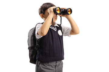 Schoolboy looking through binoculars