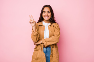 Young mixed race indian woman isolated showing number two with fingers.