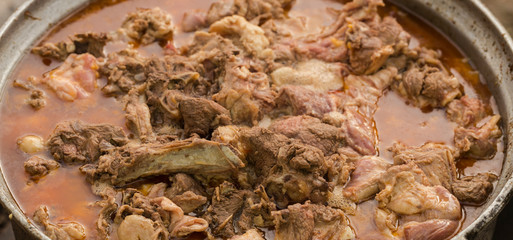 Kavurma is a Turkic sheep meat dish. Pieces of meat are stewed in a large cauldron over an open...