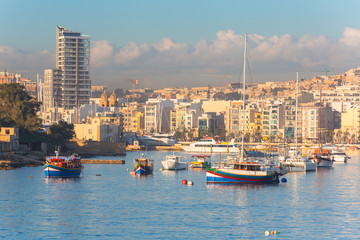 Traditional fishing boats in the harbor of Sliema, Malta