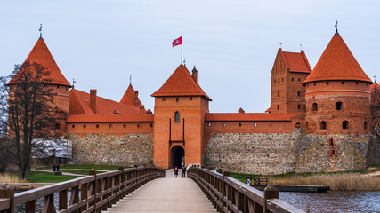 Fototapeta na wymiar Medieval red brick castle on island in Trakai, Lithuania.