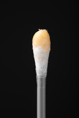 Cotton sticks isolated on black background. Ear stick