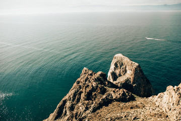 Baikal sea beach with rock 