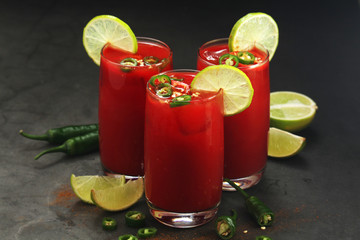 Jalapeno tomato margarita cocktail with lime