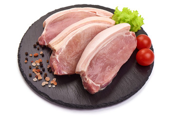 Fresh Pork loin steaks, isolated on white background