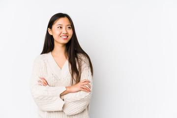 Young chinese woman isolated smiling confident with crossed arms.