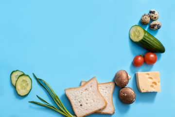 Ingredients for burger on black background, flat lay