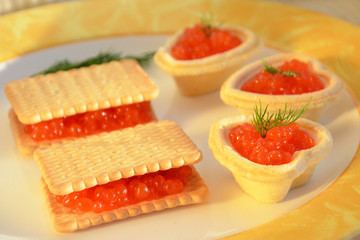 caviar sandwiches on a plate 