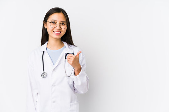 Young Doctor Chinese Woman Isolated Smiling And Raising Thumb Up