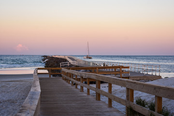 Idyllic Sunset Sailing at the Ponce Inlet Jetty Along the East Coast ofFlorida